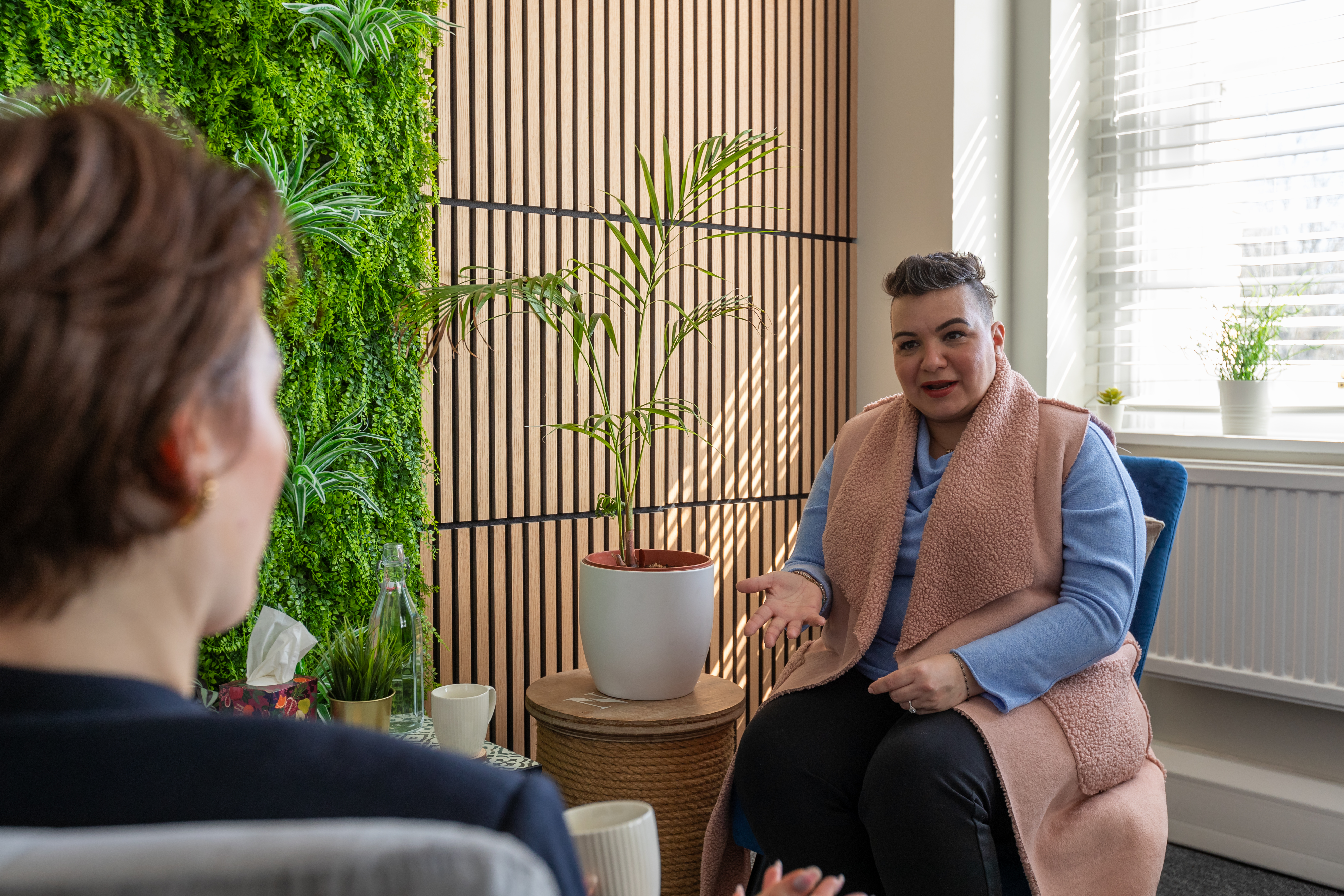 Rossella Todde speaking with a client in her counselling room