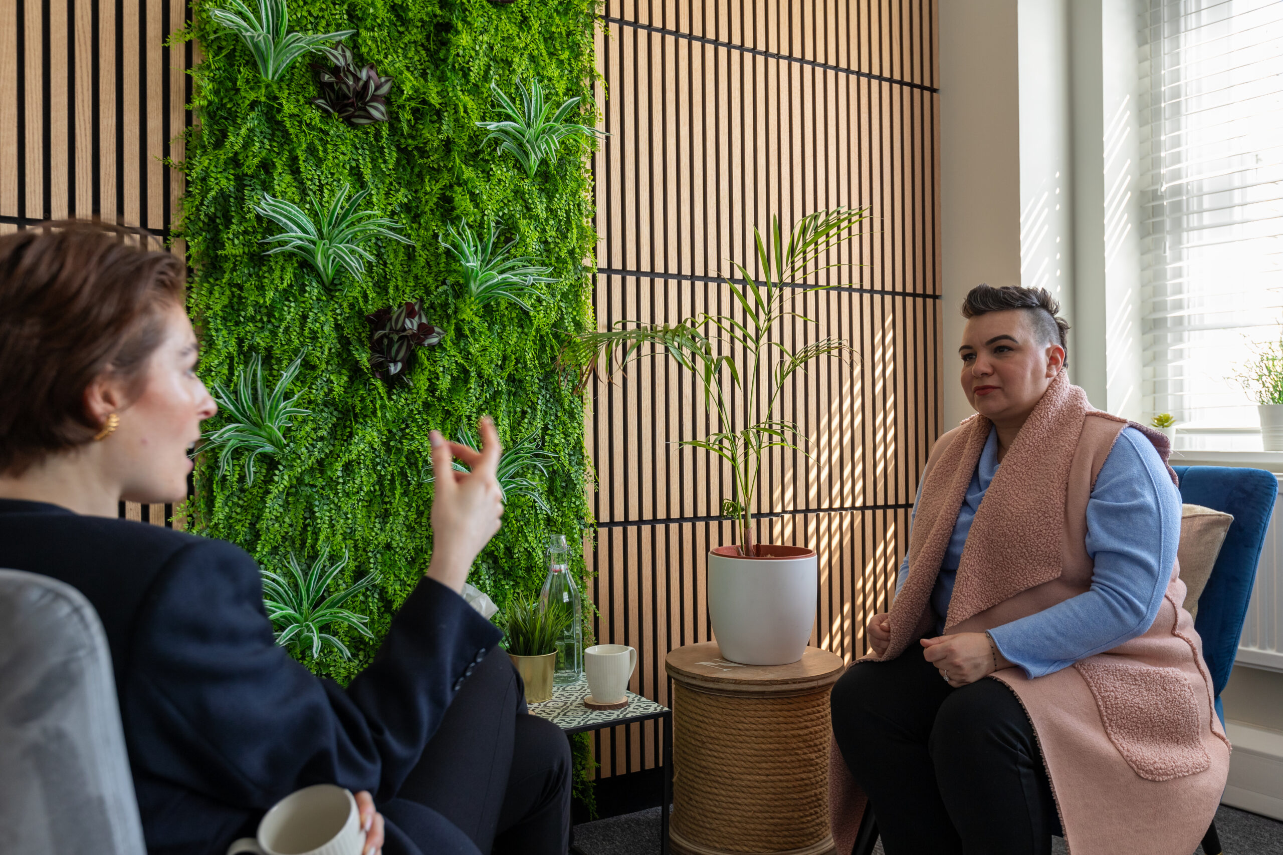 Rossella Todde seated with a client during a counselling conversation
